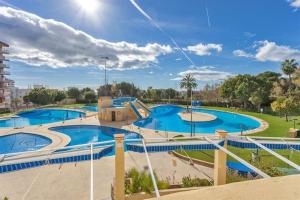a large swimming pool with two pools at New Studio Minerva Benalmadena Side Sea Views in Benalmádena