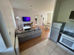 Η κουζίνα ή μικρή κουζίνα στο Charmant appartement RDC familial ou pour le travail