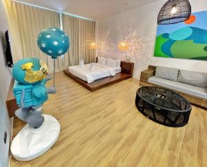 Letto o letti in una camera di Nacpan Beach Resort Managed by H Hospitality Group