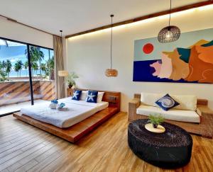 Area soggiorno di Nacpan Beach Resort Managed by H Hospitality Group