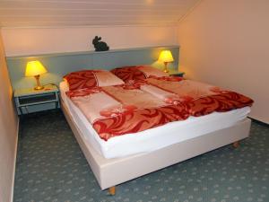 Ein Bett oder Betten in einem Zimmer der Unterkunft Hotel Grüner Baum