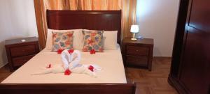 Postel nebo postele na pokoji v ubytování Sawa self catering
