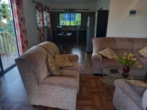 Posezení v ubytování Sawa self catering + 1 fotografie