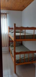 Ένα ή περισσότερα κρεβάτια σε δωμάτιο στο Morada do Zeca +46 φωτογραφίες