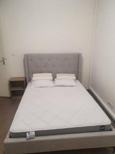 Postel nebo postele na pokoji v ubytování Appartement agréable dans résidence calme avec Wifi