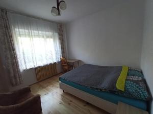 Posteľ alebo postele v izbe v ubytovaní Pokój w Warszawie-Wawer