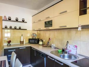 a kitchen with a sink and a counter top at Nera-etwa Konjic 1 apartment in Konjic +14 photos