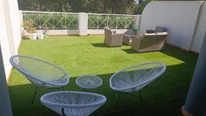 A garden outside MET&GOLF OLIVA NOVA BEACH JARDIN