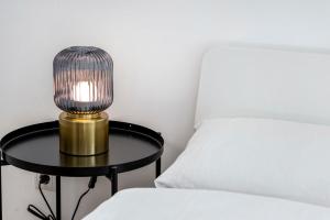Łóżko lub łóżka w pokoju w obiekcie A&S Center Apartment Vienna
