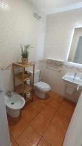 A bathroom at MET&GOLF OLIVA NOVA BEACH JARDIN