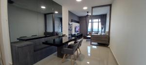 a bathroom with a counter and chairs in a room at Modern Lifestyle ARC Austin Hills in Johor Bahru