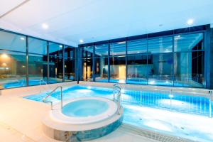 Bazén v ubytovaní Resort HEVENIA Rewal 3 alebo v jeho blízkosti