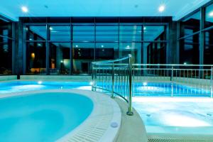 Bazén v ubytovaní Resort HEVENIA Rewal 3 alebo v jeho blízkosti