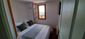 Posteľ alebo postele v izbe v ubytovaní Le 108C les matins du sancy