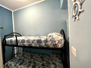 Postel nebo postele na pokoji v ubytování Casa del Pescatore