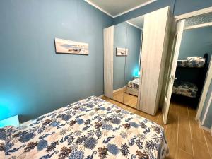 Postel nebo postele na pokoji v ubytování Casa del Pescatore