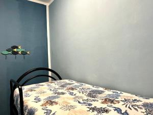 Postel nebo postele na pokoji v ubytování Casa del Pescatore