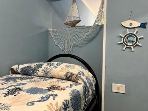 Postel nebo postele na pokoji v ubytování Casa del Pescatore