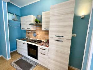 Kuchyň nebo kuchyňský kout v ubytování Casa del Pescatore