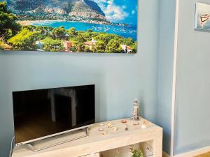 TV a/nebo společenská místnost v ubytování Casa del Pescatore
