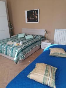 A bed or beds in a room at Casa Domenico