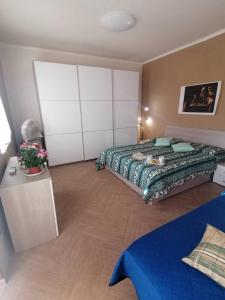 A bed or beds in a room at Casa Domenico