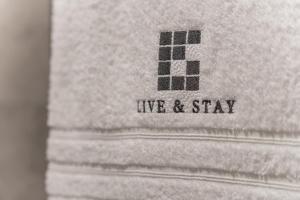 Certifikát, hodnocení, plakát nebo jiný dokument vystavený v ubytování Live and Stay Ekmanska