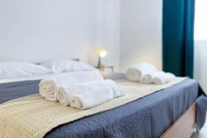 Voodi või voodid majutusasutuse Relax e spazio a due passi dal mare toas