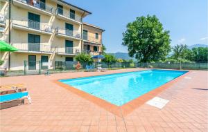 The swimming pool at or close to Lovely Apartment In Arpiola-Pianturcano