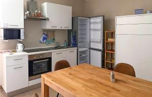 A kitchen or kitchenette at Lovely Apartment In Arpiola-Pianturcano