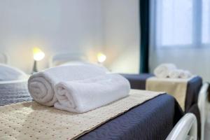 Voodi või voodid majutusasutuse Relax e spazio a due passi dal mare toas