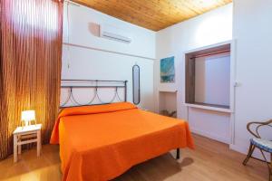 Кровать или кровати в номере Villa con piscina al mare