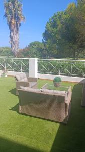 A garden outside MET&GOLF OLIVA NOVA BEACH JARDIN