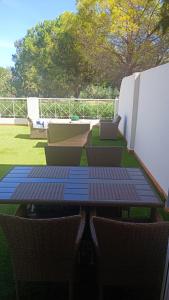A garden outside MET&GOLF OLIVA NOVA BEACH JARDIN