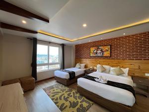 Voodi või voodid majutusasutuse Hotel Kesu Home toas