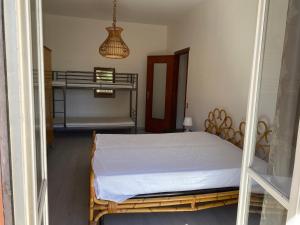 Postel nebo postele na pokoji v ubytování Casa al Mare di Vadino