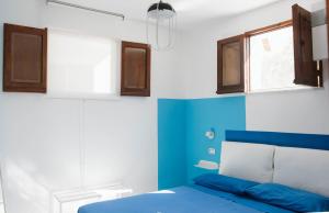 Postel nebo postele na pokoji v ubytování Casa aMmare