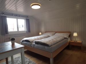 מיטה או מיטות בחדר ב-Casa Crap