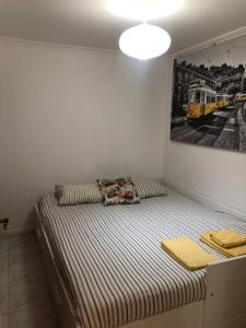 Łóżko lub łóżka w pokoju w obiekcie Ocean Corner Belém