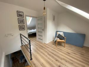 Łóżko lub łóżka w pokoju w obiekcie Apartament Chleb i Wino