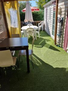 Ogród w obiekcie Grand Mobile home dans camping