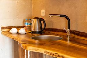 A kitchen or kitchenette at Atilla's Cave Hotel
