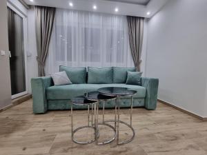 Predel za sedenje v nastanitvi Apartman Ivkovic