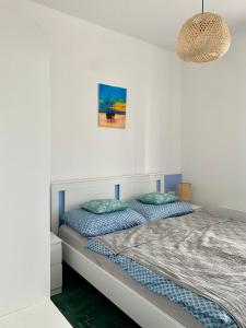 Posteľ alebo postele v izbe v ubytovaní Pacsirta Vendégház