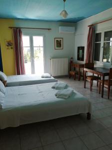 Llit o llits en una habitació de Lontza Apartments