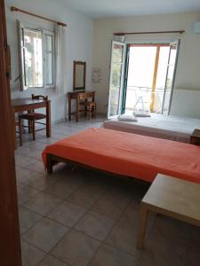 Tempat tidur dalam kamar di Lontza Apartments