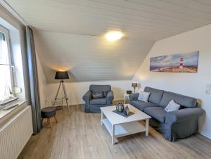 Posezení v ubytování Das Inselhaus