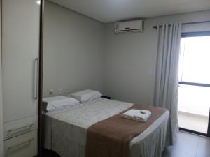 Postel nebo postele na pokoji v ubytování Hotel Solar Vitória