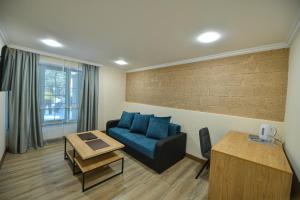 Posezení v ubytování Madin Eco Hotel