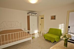 Posteľ alebo postele v izbe v ubytovaní Guesthouse Totićevi